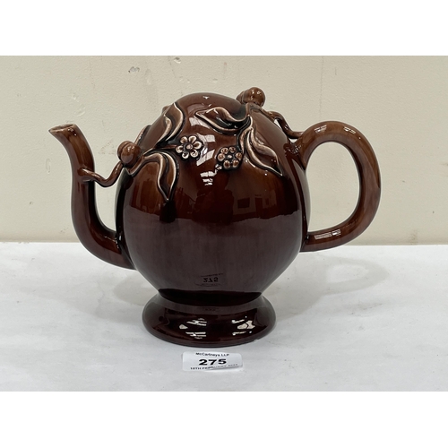 275 - A 19th Century treacle glazed Cadogan teapot. 6½