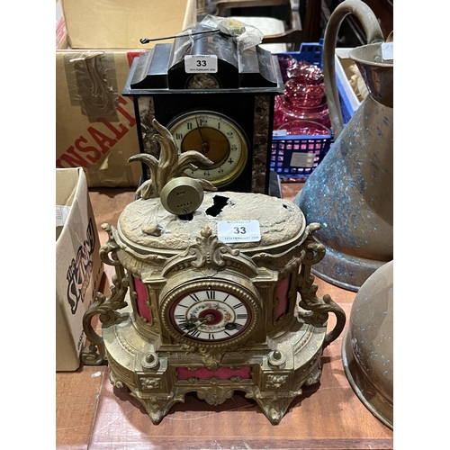 33 - A 19th Century black slate mantle clock and another in gilt speltar (AF).