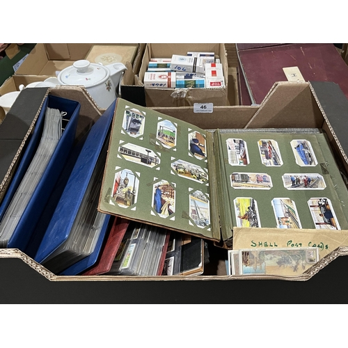 46 - A box of cigarette cards in albums and sleeves.