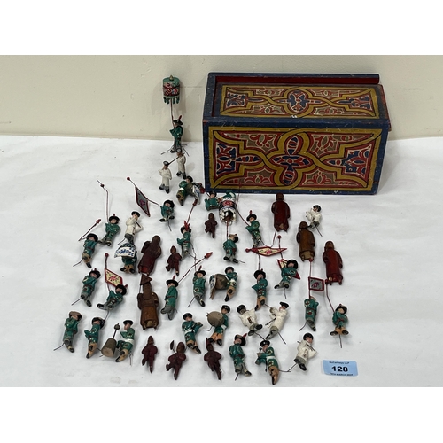 128 - A collection of Chinese painted figures in polychrome decorated box.