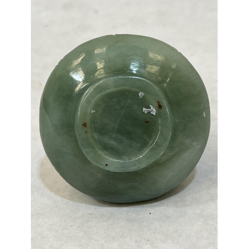 102A - A Chinese green jade jug and cover, carved in the form of a cockerel. 3