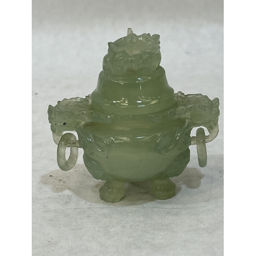 103A - A Chinese green jade koro and cover on tripod paw feet. 2¾