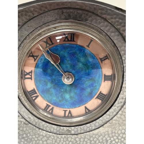 127 - A Liberty & Co Tudric pewter mantle timepiece, model no 01126B, the blue and green enamelled dial wi... 