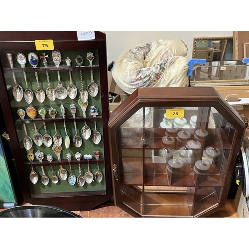 75 - Two display cases, one containing a collection of plated crested spoons.