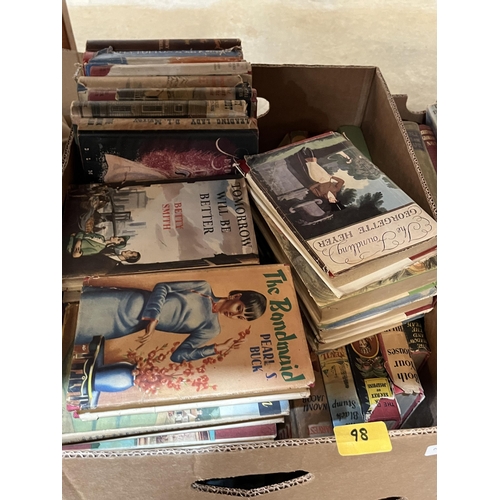 98 - Four boxes of books.