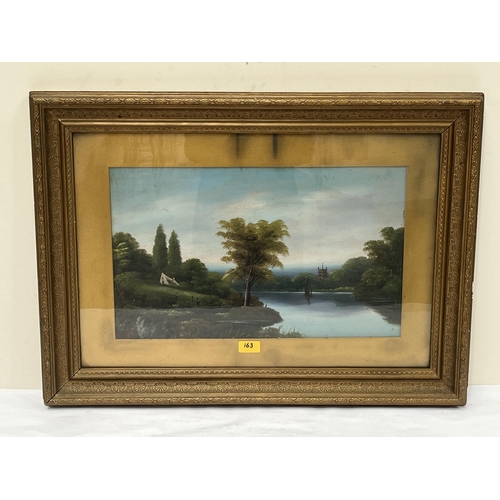 163 - A gilt framed watercolour harbour scene after Sicard and a gilt framed oil river landscape.