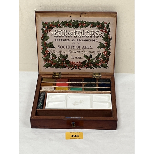 303 - An early 20th Century George Rowney mahogany watercolour paint box. 7½