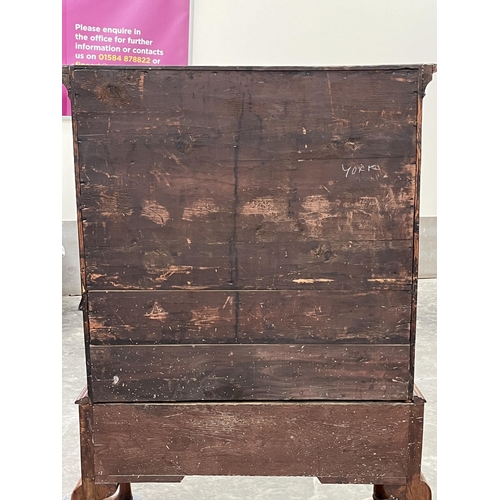 397 - A George II walnut chest on stand with two short over three long herringbone banded graduated drawer... 