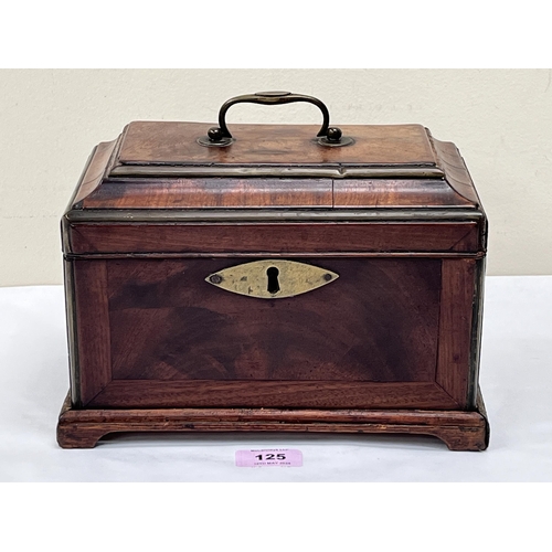 125 - A George III mahogany pagoda topped tea caddy on bracket feet. 10