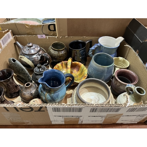 18 - A box of studio pottery.