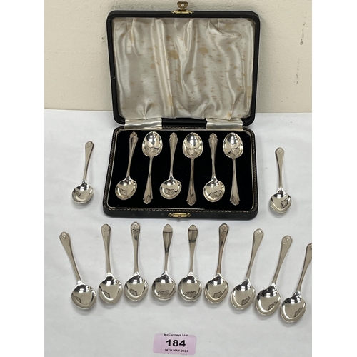 184 - A George VI set of six cased silver teaspoons, Birmingham 1942; together with eleven other silver te... 