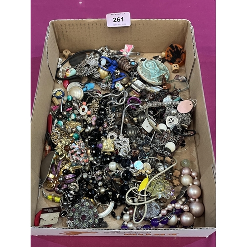 261 - A box of costume jewellery.