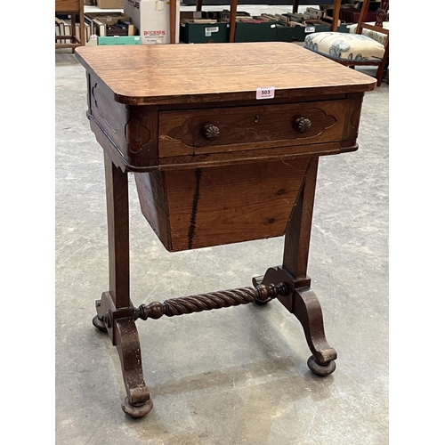 503 - A Victorian oak work table on trestle support. 22