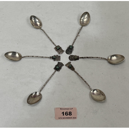 168 - A set of six continental silver teaspoons with twisted stems, the terminals set with an uncut green ... 