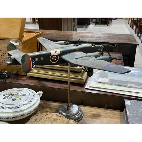 21 - A scratch built model of a Lancaster bomber on metal stand. Wingspan 24½