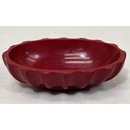 222 - A Chinese red jasparware ovoid fluted bowl or brush pot. 3½