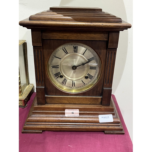 4 - An American walnut cased mantle clock. 12