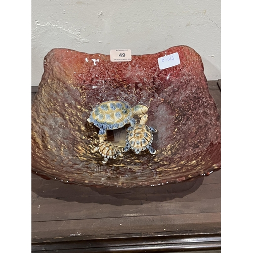 49 - A studio style glass bowl and three Wade graduated tortoises.