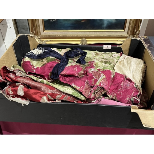 5 - A box of textiles.