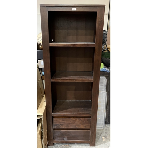 512 - An open display cabinet with two base drawers. 64