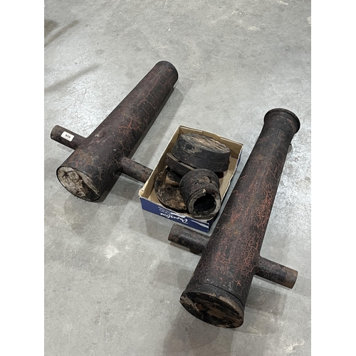 515 - A pair of ornamental metal and wood cannon barrels, 29