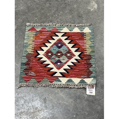 520 - A Chobi Kilim rug, 0.44m x 0.48m.