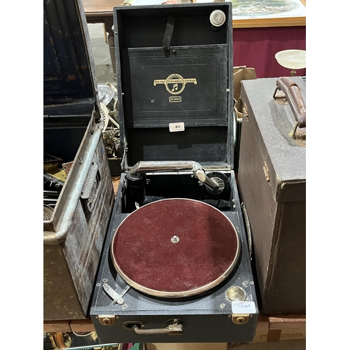 61 - A 1930s picnic gramophone and two boxes of records.