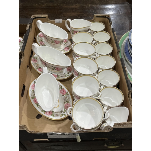 11 - A Royal Worcester Royal Garden pattern table service of 74 pieces.