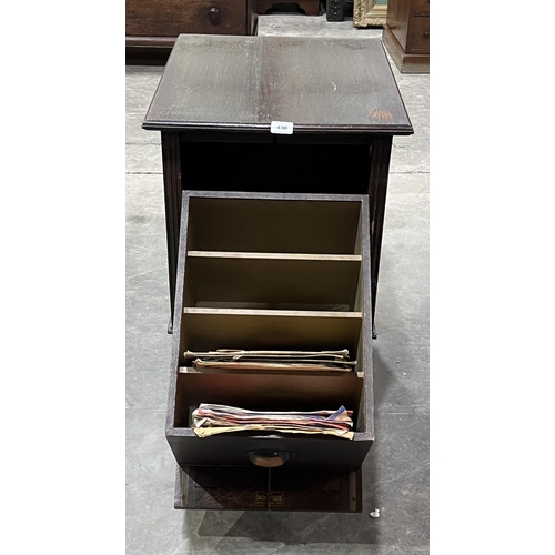 430 - A 1920s oak record cabinet with fall front. 18½