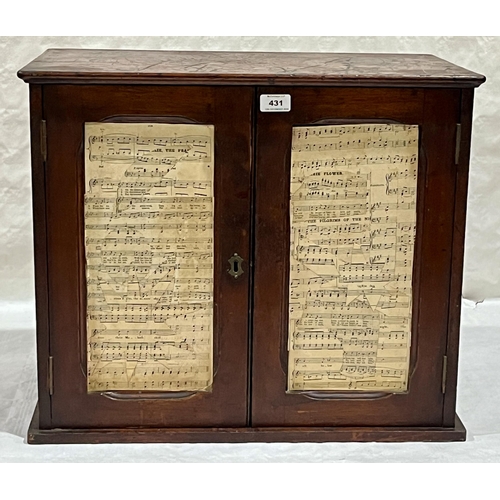 431 - A 19th Century mahogany music cabinet, 23