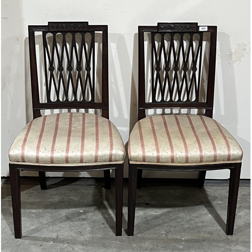 433 - A pair of 19th Century mahogany lattice backed chairs.