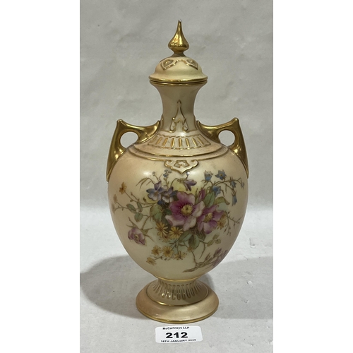 212 - A Royal Worcester blush ivory ovoid two handled vase and cover. Shape 1766. 9½