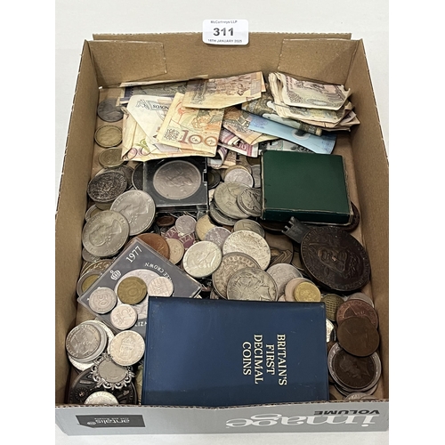 311 - A collection of coins and banknotes