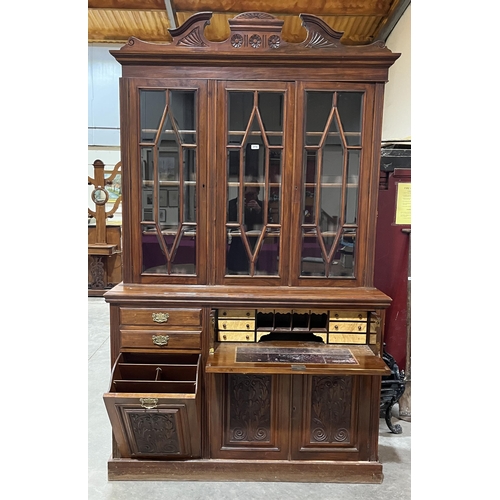 354 - A Victorian walnut secretaire library bookcase, enclosed by three astragal bevelled glazed doors ove... 