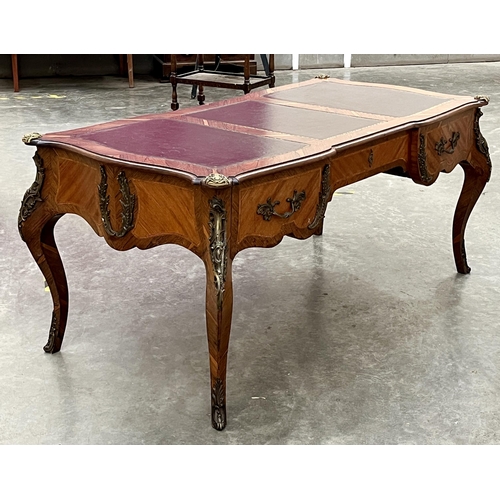 384 - An early 20th Century French Napoleon III style rosewood, line inlaid and satinwood banded bureau pl... 