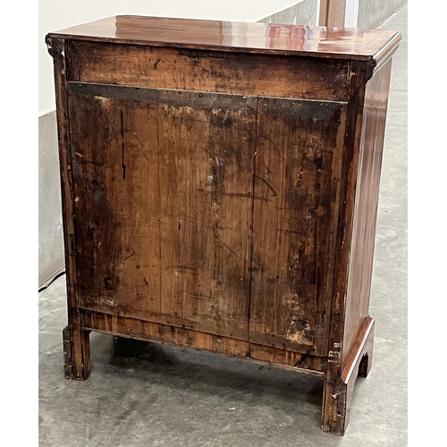 385 - An 18th Century walnut and inlaid Norfolk chest with canted top and fluted corners, the cupboard doo... 