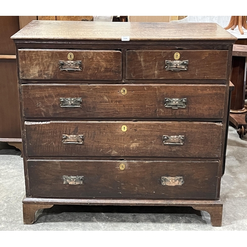 394 - An 18th century oak chest of drawers on bracket feet. 44