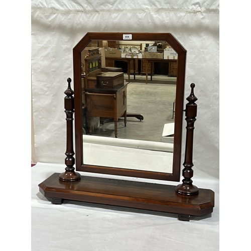 404 - A Victorian mahogany dressing table mirror. 32