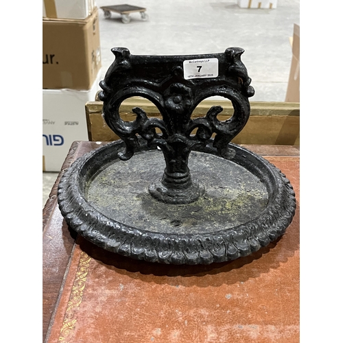 7 - A Victorian cast iron boot scraper. 12