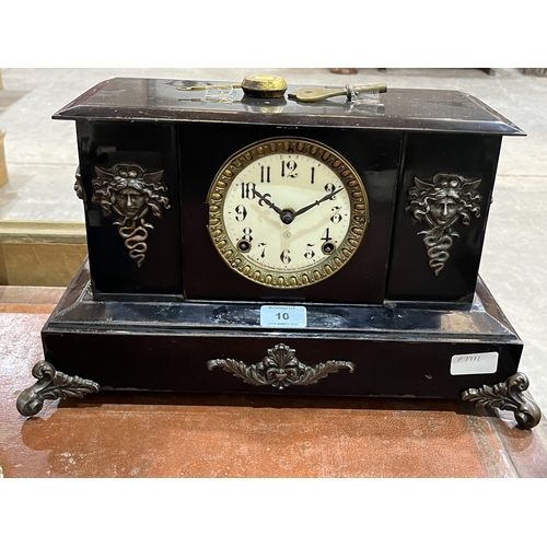 10 - A late 19th century metal cased American mantle clock. 17