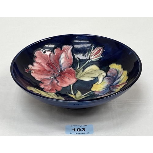 103 - A Moorcroft Hibiscus pattern tube-lined bowl. Signed. 7½