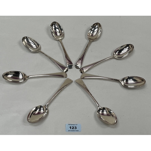 123 - A set of eight George V silver dessert spoons. London 1916. 13ozs 4dwts