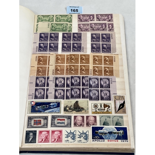 165 - A stock book of USA stamps, both mint and used