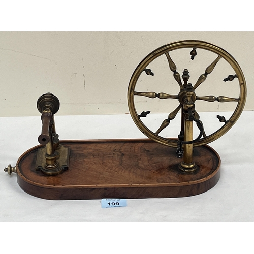 199 - A 19th century French gilt brass rouet or table yarn winder on burr wood plinth base. 12½