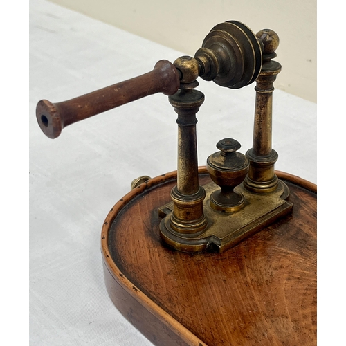 199 - A 19th century French gilt brass rouet or table yarn winder on burr wood plinth base. 12½