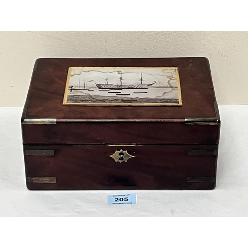 205 - An early 19th century mahogany box with brass corner angle mounts, the lid with a reverse glass pane... 