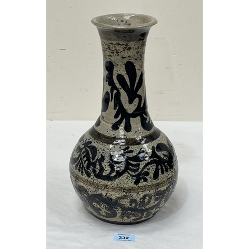 232 - ALAN WALLWORK. BRITISH 1931-2019 A studio pottery tall vase decorated in black with bands of stylise... 