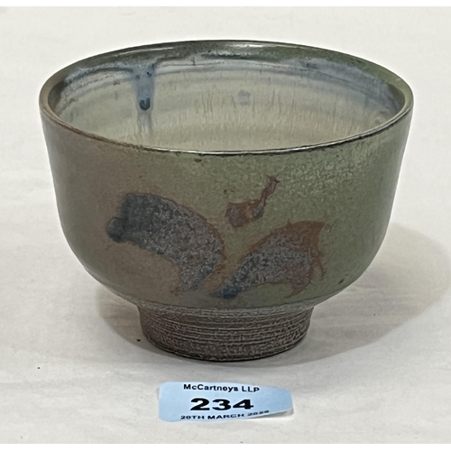 234 - RAY FINCH (FOR WINCHCOMBE POTTERY). BRITISH 1914-2012 A studio pottery green glazed footed bowl. Imp... 