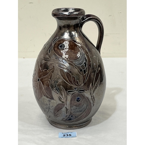 235 - WIM MUHLENDYCK. GERMAN 1905-1986 A stoneware pitcher, sgraffito decorated with marine life on a lust... 