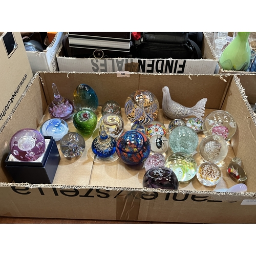 A box of glass paperweights